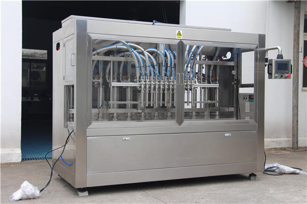 Riempitrice di miele completamente automatica in bottiglia 