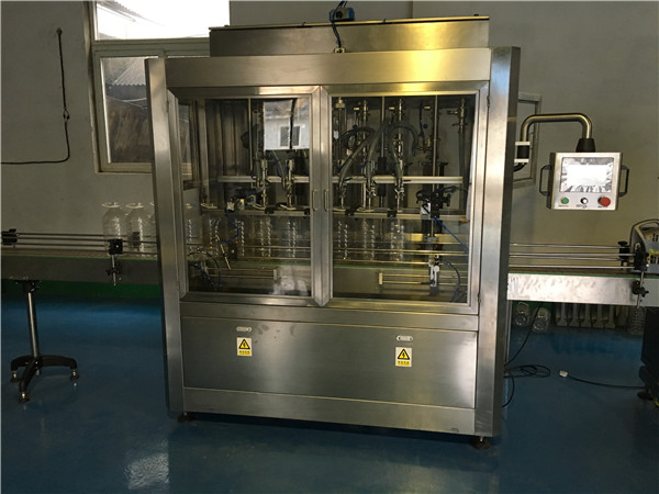 Macchina di riempimento di olio commestibile di tipo lineare Cina