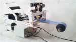 Piccola etichettatrice per bottiglie rotonde